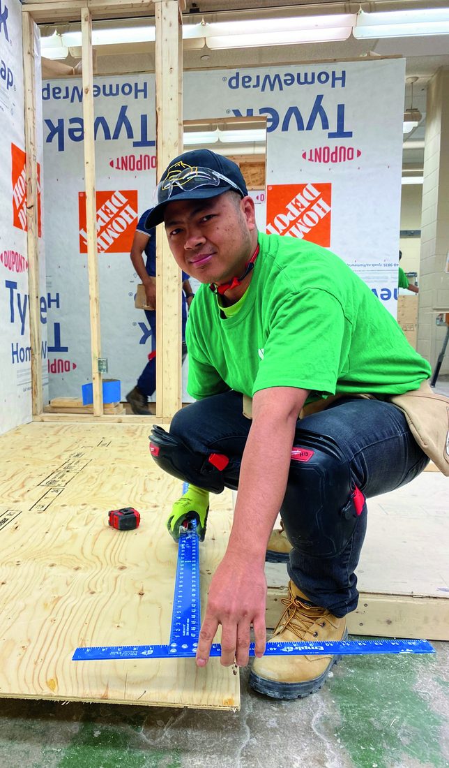 YMCA skilled trades program participant on site